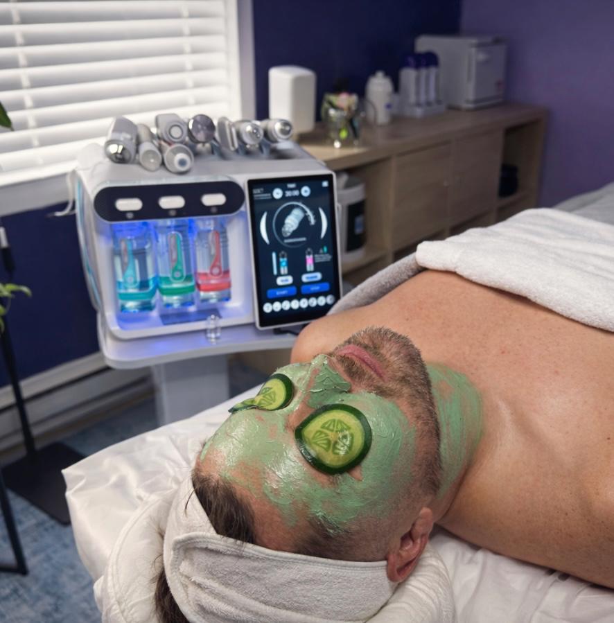 Men’s facial at Damon Spa Studio For Men in Vancouver with skincare mask and professional hydro-facial equipment.