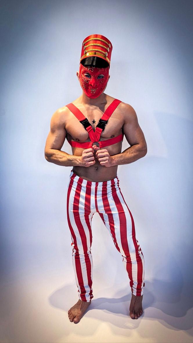 Damon in a Christmas Nutcracker go-go dancer costume at The Gay Agenda in Vancouver