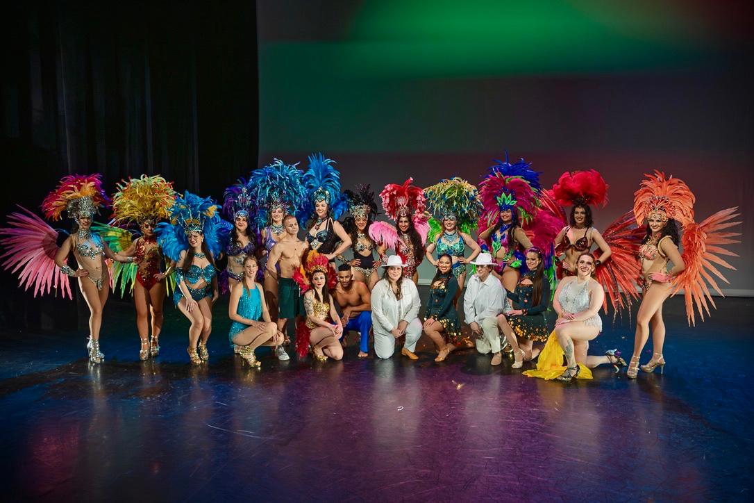 Group photo on stage with the Samba Fusion Brazilian dance team in Vancouver